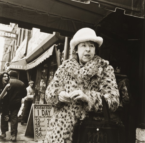 Woman in Imitation Leopard Skin Coat
