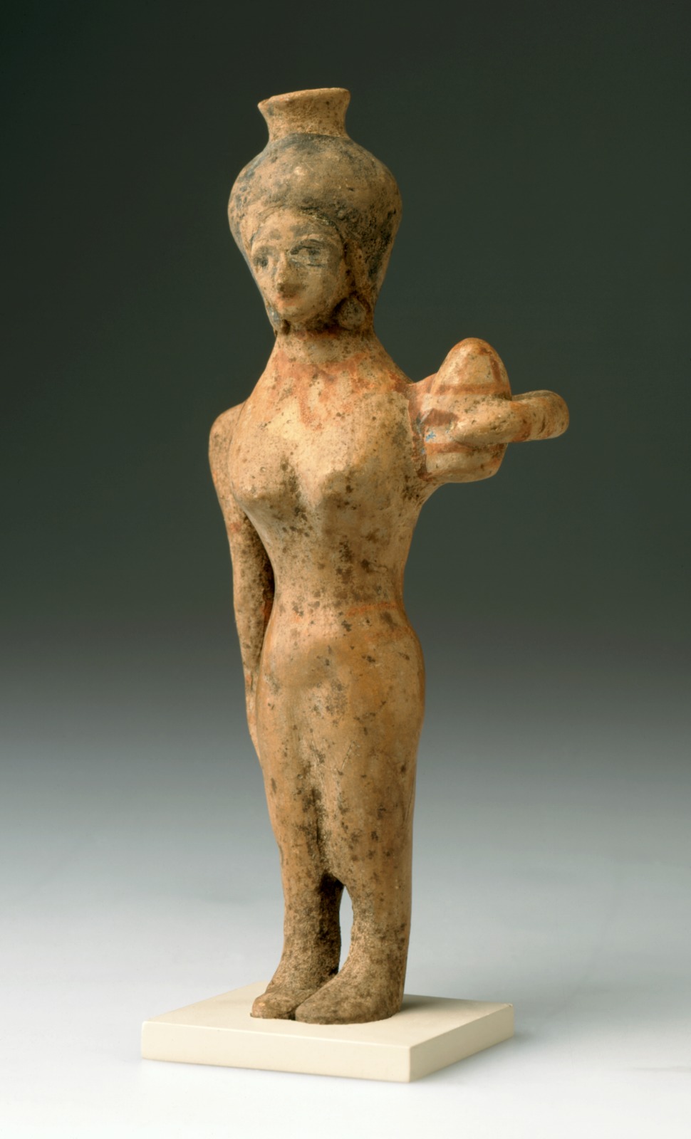 Vessel in Shape of Foreign Woman with Vase