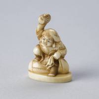Netsuke in Form of Daikoku Lifting His Mallet
